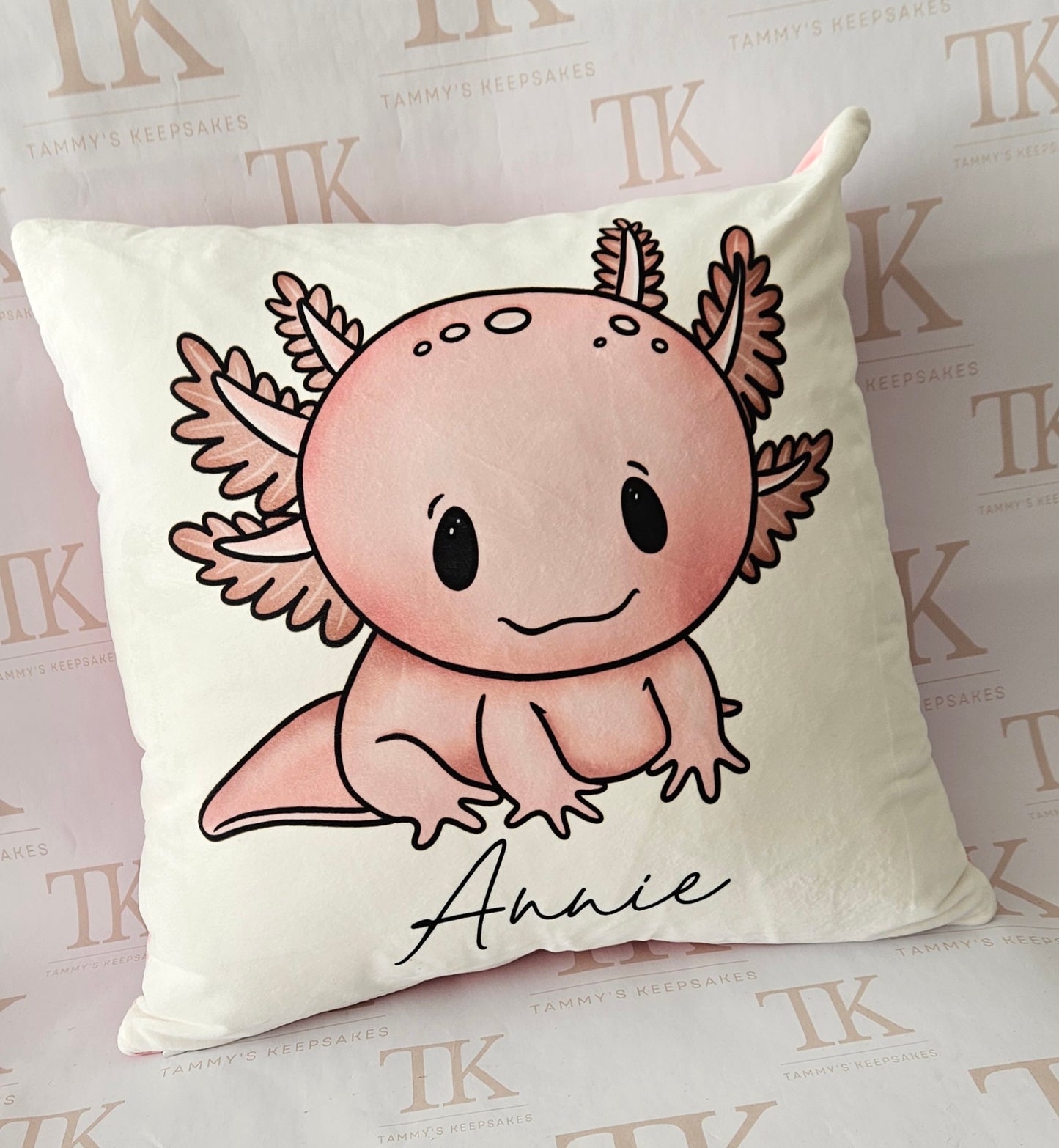 Pink personalised axolotl cushion